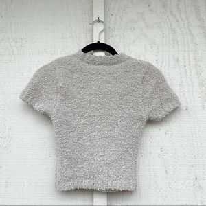 green SKIMS cozy top